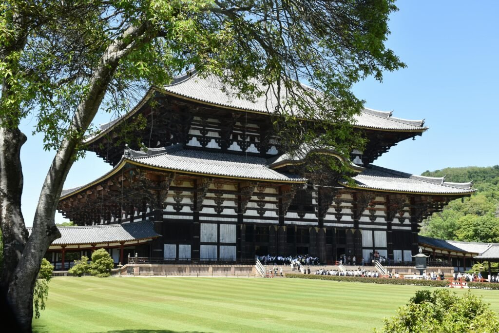A stunning view of the Great Buddha Hall in Nara, Japan, showcasing traditional architecture on a clear day.